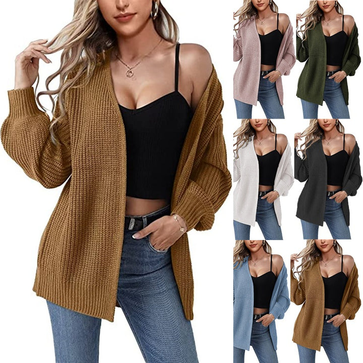 Kvinnens chunky strikket cardigan med en avslappet fasong og åpne masker Skjora