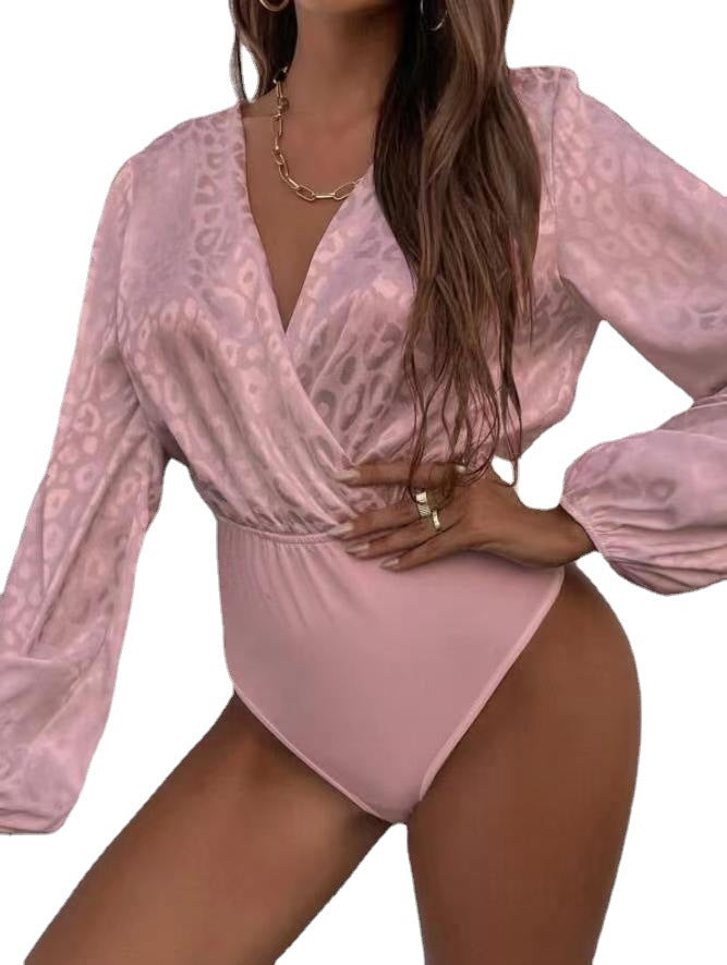 Dame body med elegant omslagshalsskjæring og voluminøse ermer Skjora