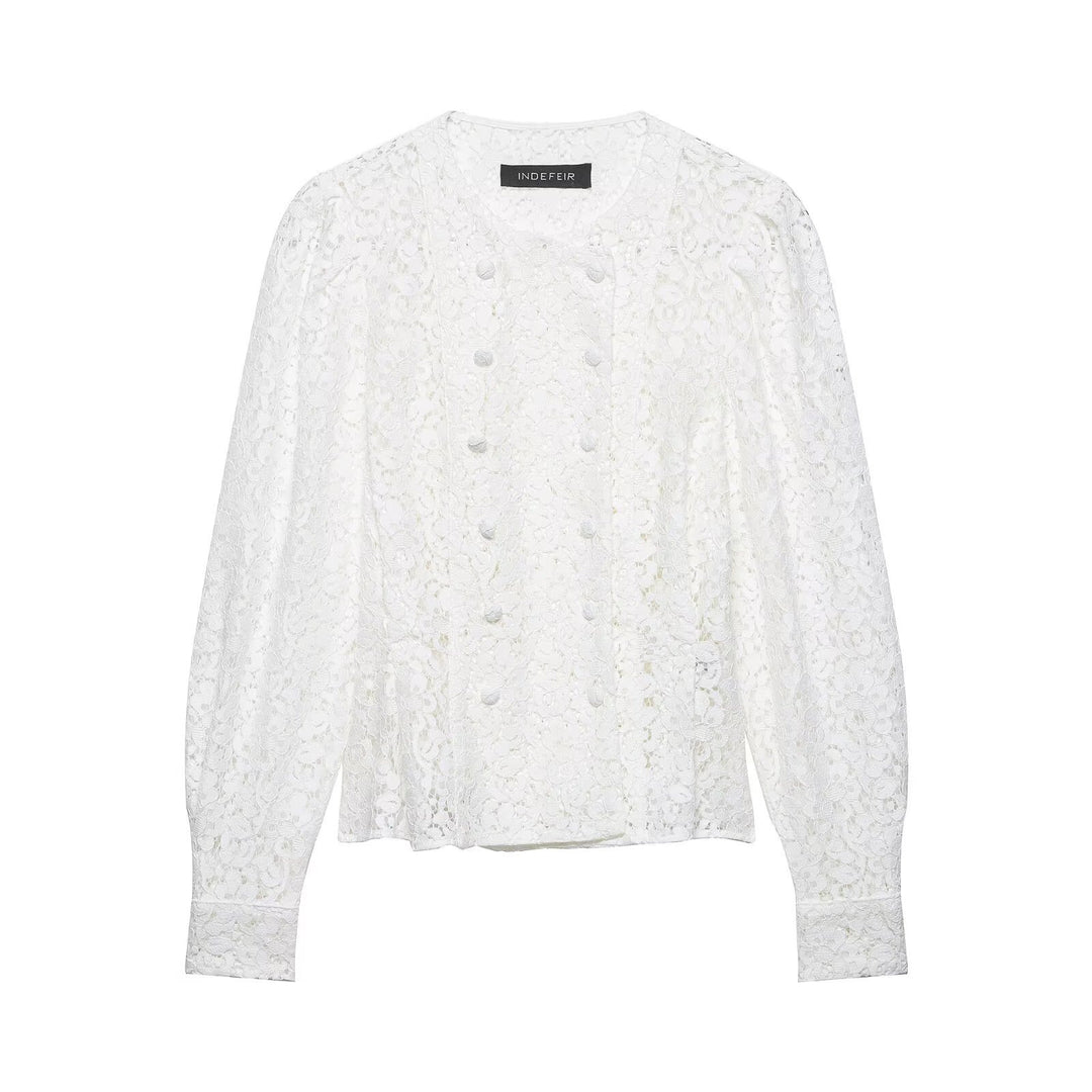 Dame spissbluse med dekorative knapper og elegant passform Skjora