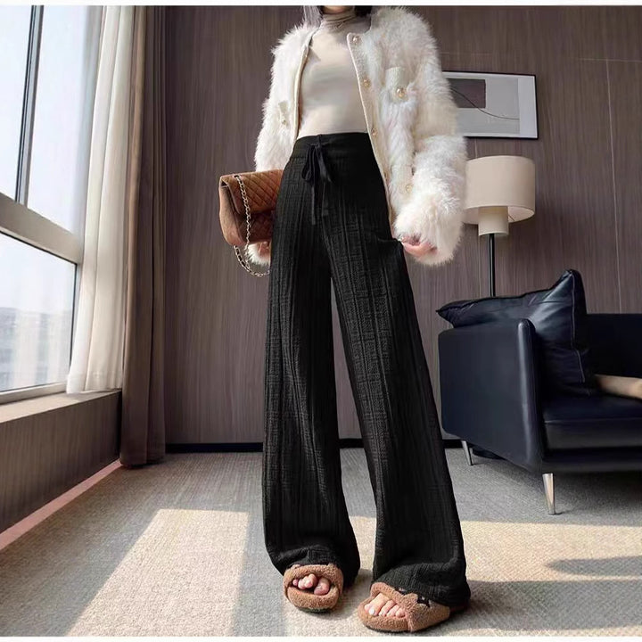Women's loose summer trousers with elastic waist and fixed stripe pattern Skjora