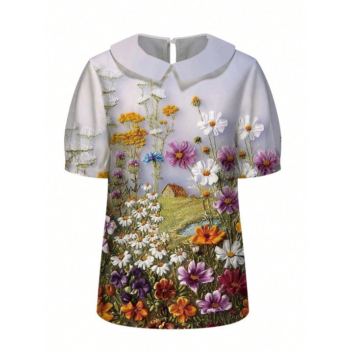 Dame kortermet bluse med florale accenter og klassisk krage Skjora