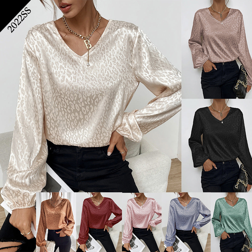 Kvinnes elegant bluse topp med v-hals og voluminøse ermer Skjora