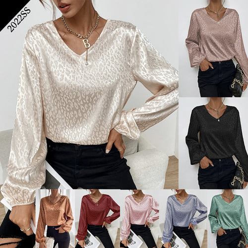 Kvinnes elegant bluse topp med v-hals og voluminøse ermer Skjora