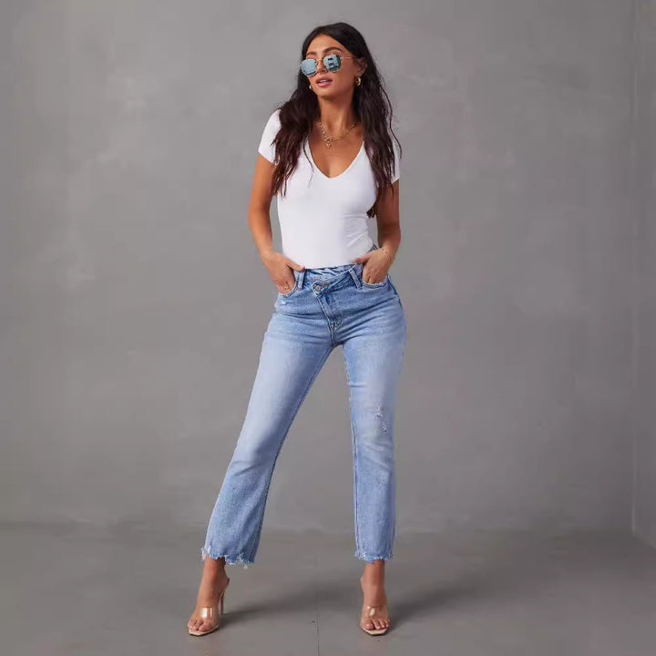 Kvinne høyt liv jeans med trendy frynser og slitte detaljer Skjora