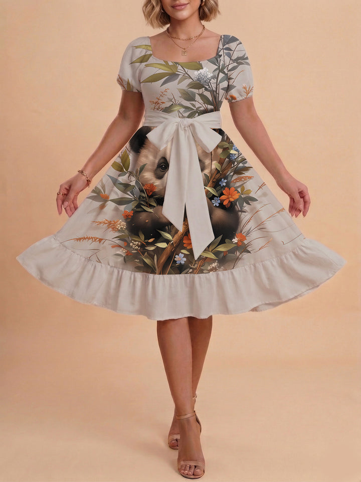 Damen Sommerliches Blumenkleid mit taillierbarem Gürtel und voluminösen Ärmeln Skjora