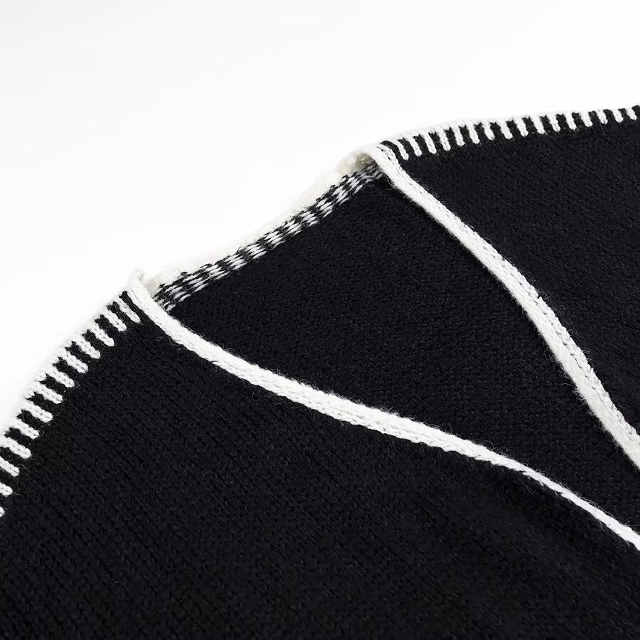 Kvinnenes åpne cardigan med elegante kontrastsømmer Skjora