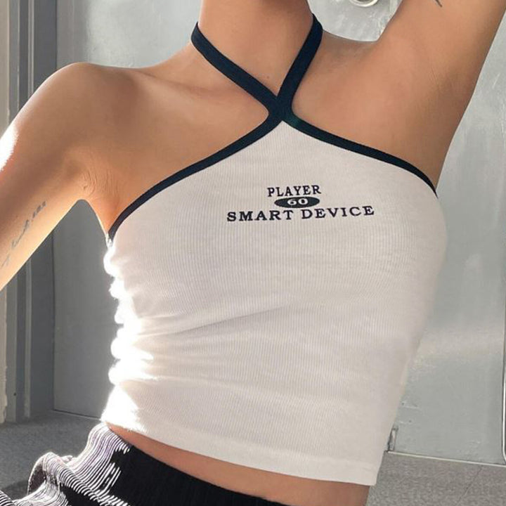Dame cropped topp med asymmetrisk stroppeskjæring og grafikktrykk Skjora