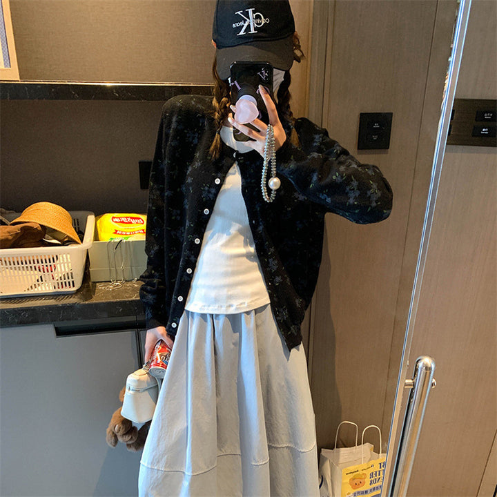 Dame cardigan med blomstermønster og knappeåpning Skjora