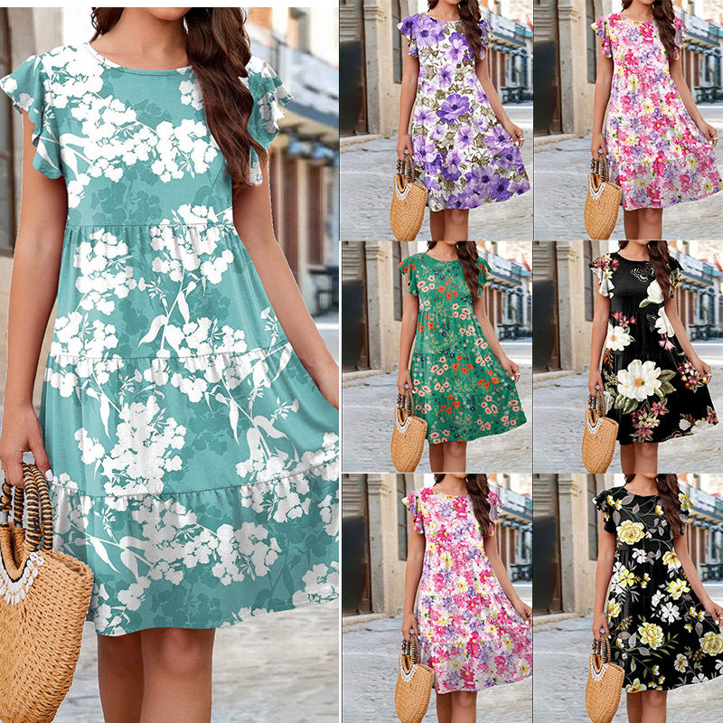 Dame blomster-midi-kjole med volangdetaljer og feminin silhuett Skjora