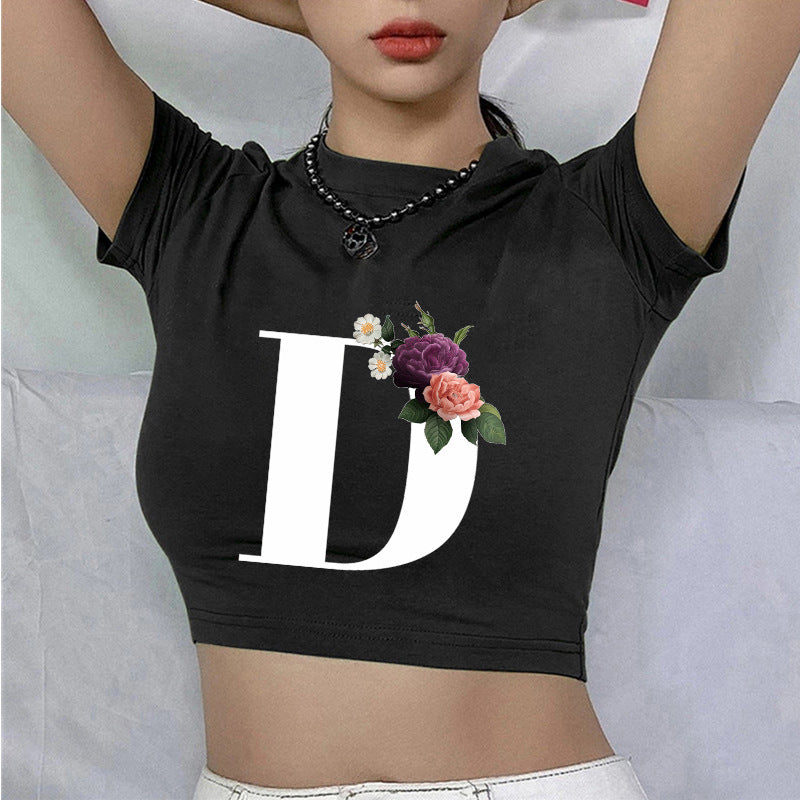Dame cropped T-skjorte med blomstrede initialdesign Skjora