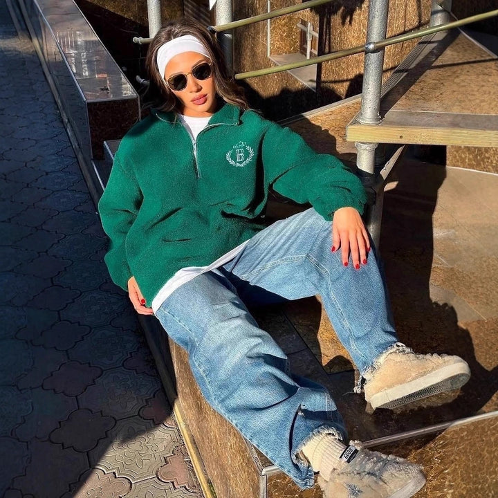 Dame oversized fleece genser med glidelås og brodert logo Skjora