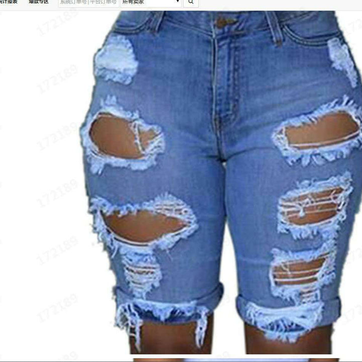 Damene Destroyed Denim-bukser med avslappet passform og stilige rippe-detaljer Skjora