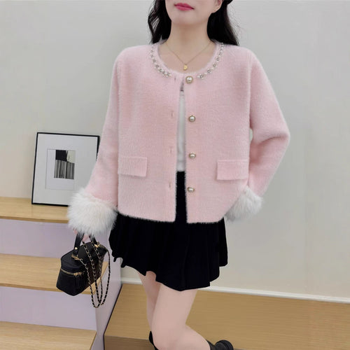 Damer elegant cardigan med perledekorasjon og fluffy ermer Skjora