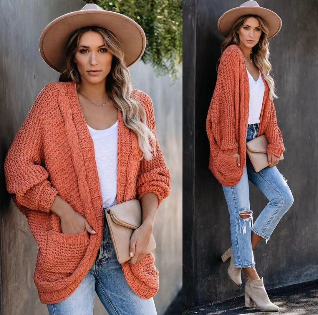 Kvinnes chunky strikk cardigan med uformelle lommer og voluminøse ermer Skjora