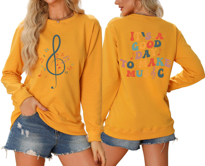 Dame sweatshirt med musikalsk motiv og kreativ skrift Skjora