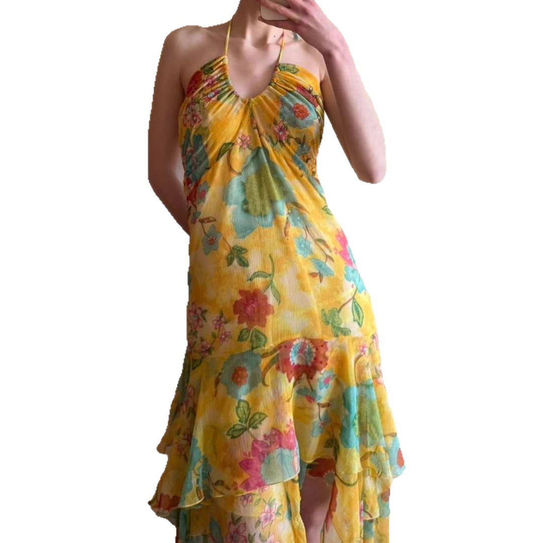 Dame maxikjole med floral lag-på-lag look og spaghetti stropper Skjora