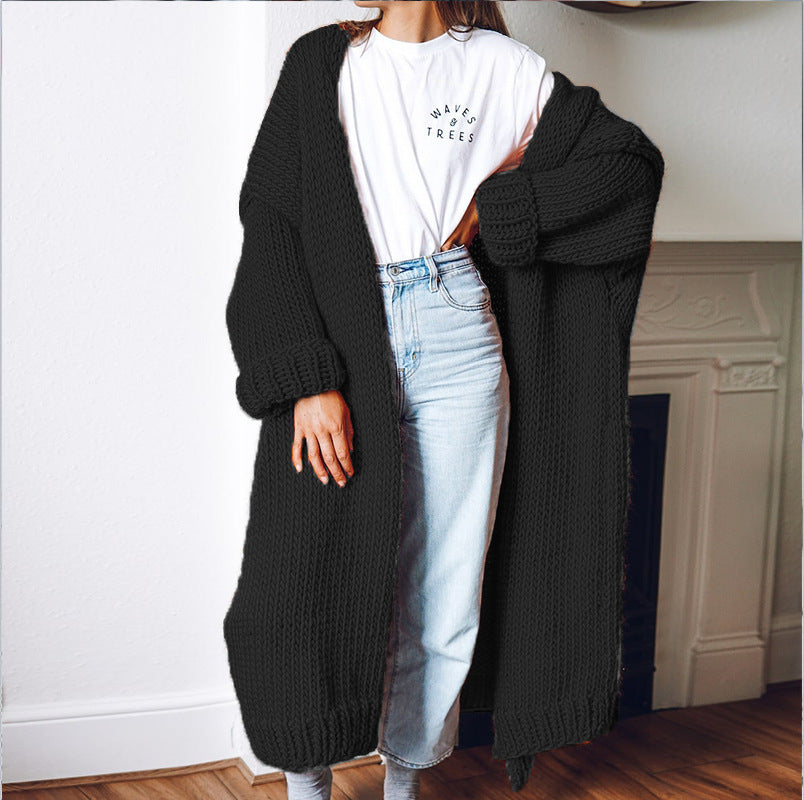 Dame chunky strikket cardigan med komfortabel oversized passform og dype lommer Skjora