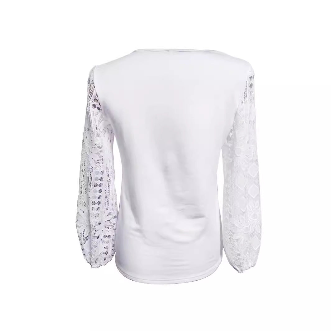 Dame designerbluse med blonder og elegant snitt Skjora