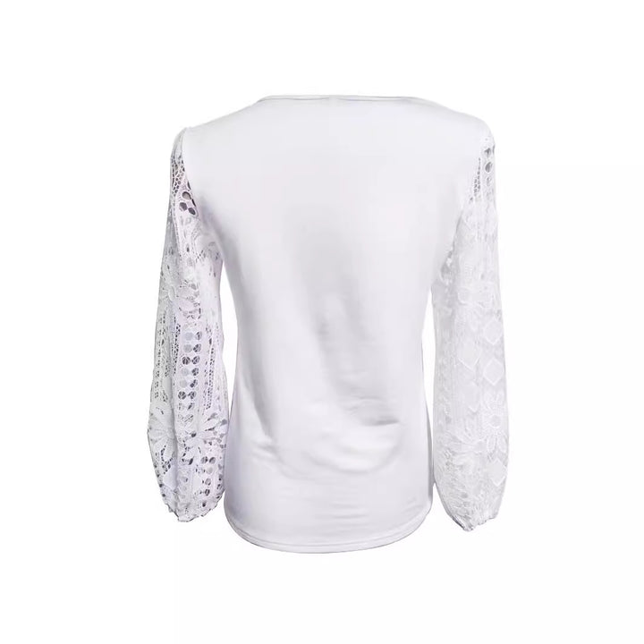 Dame designerbluse med blonder og elegant snitt Skjora