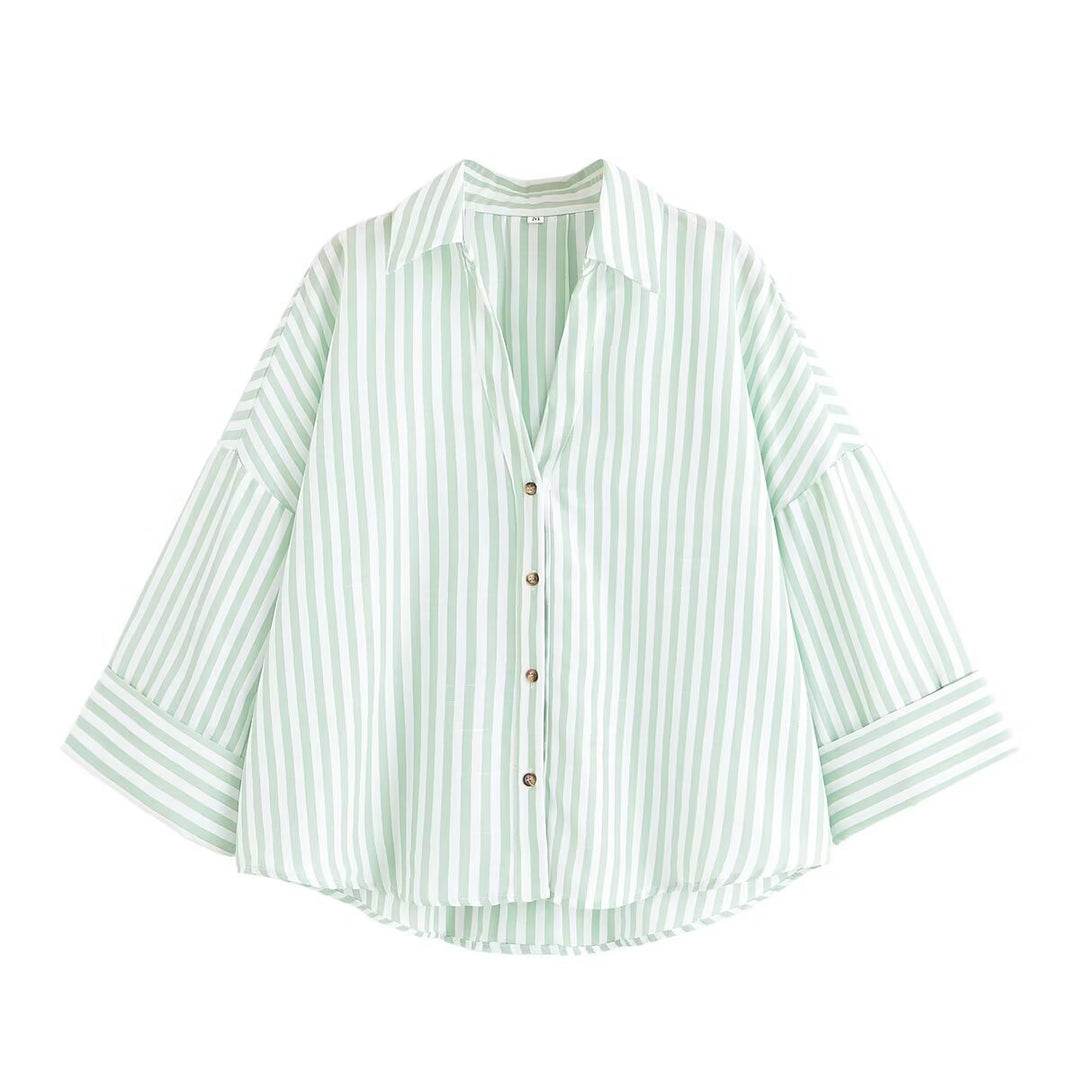 Dame skjorte-bluse med avslappet snitt og elegante 3/4-ermer Skjora