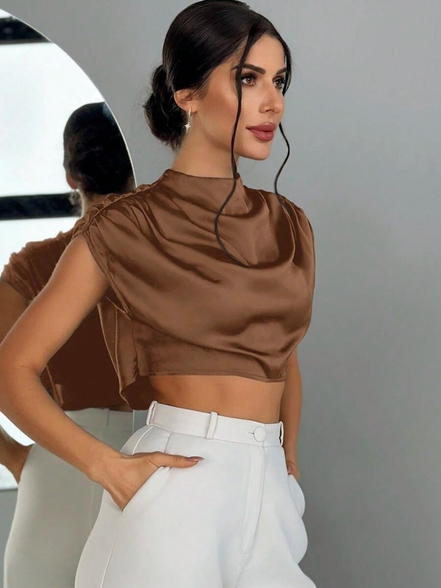 Dame Elegant Crop-Top med voluminøse ermer og edel ryggutskjæring Skjora