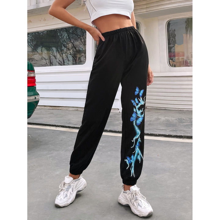 Kvinnecasual joggebukser med fargerik sommerfugl- og lyn-design Skjora