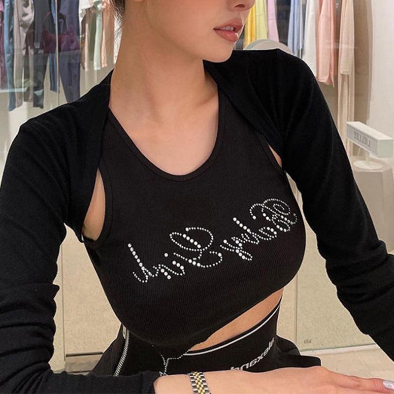 Dame Crop-Top med glitrende tekst og trendy snitt Skjora