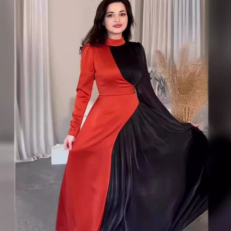 Kvinnes elegant og asymmetrisk kveldsdrakt med folderdetaljer Skjora