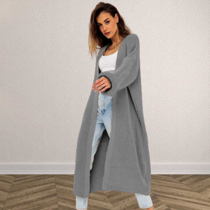 Kvinnens chunky strikk cardigan med åpen frontdesign og dype lommer Skjora