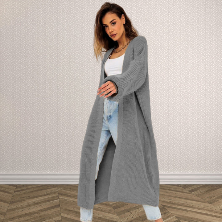Kvinnens chunky strikk cardigan med åpen frontdesign og dype lommer Skjora