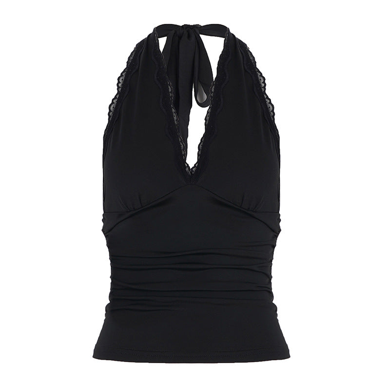 Dame Elegant halterneck-top med spennende V-u-cut og fashionable spisser accentuerer Skjora
