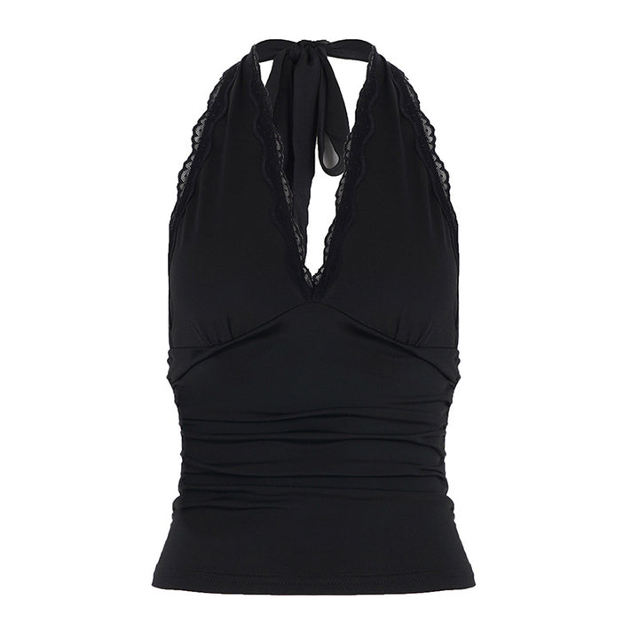 Dame Elegant halterneck-top med spennende V-u-cut og fashionable spisser accentuerer Skjora