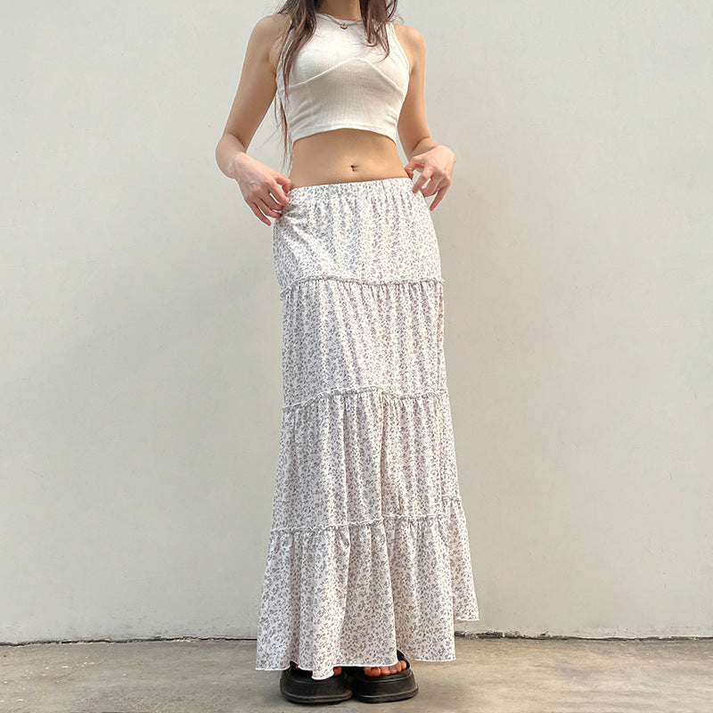 Dame Maxiskjørt med florale volanger og elastisk midje Skjora