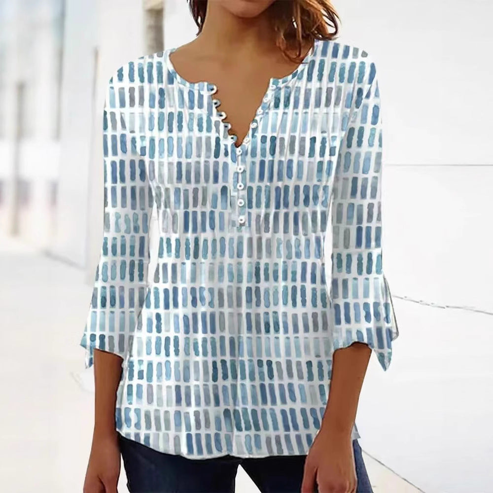 Damebluse i moderne grafisk design med knappe detaljer Skjora