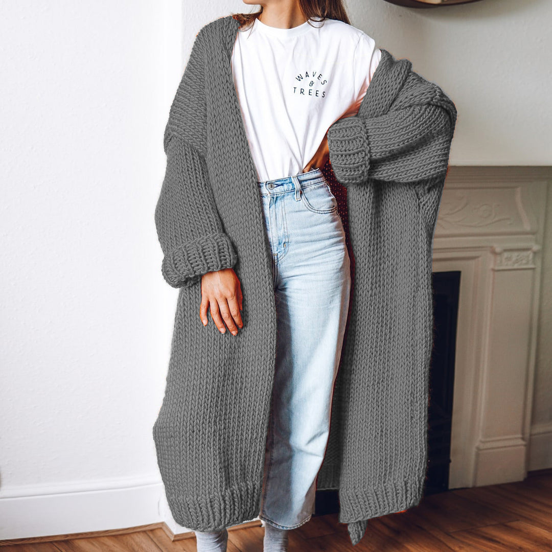 Dame chunky strikket cardigan med komfortabel oversized passform og dype lommer Skjora