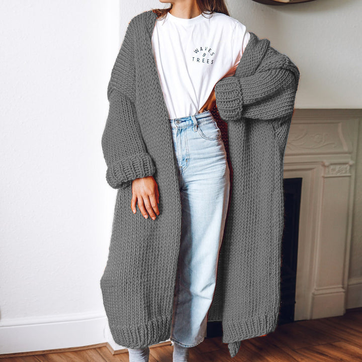 Dame chunky strikket cardigan med komfortabel oversized passform og dype lommer Skjora