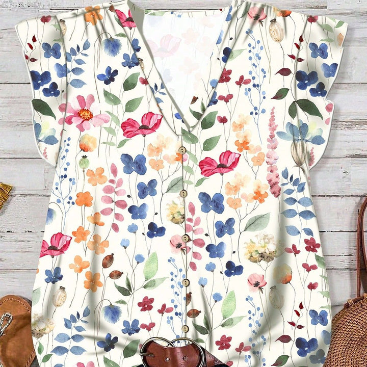 Damebluse med blomsterdesign Skjora