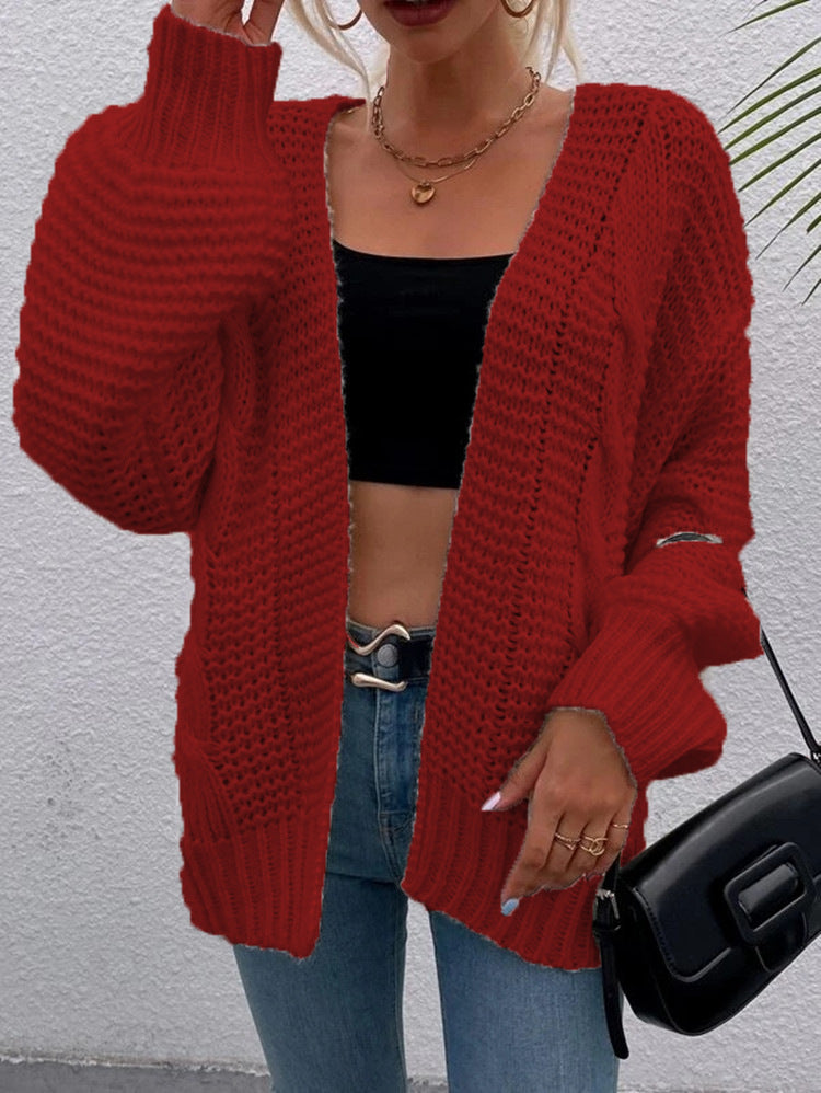 Kvinnens chunky strikket cardigan med komfortable åpne lommer og avslappet passform Skjora