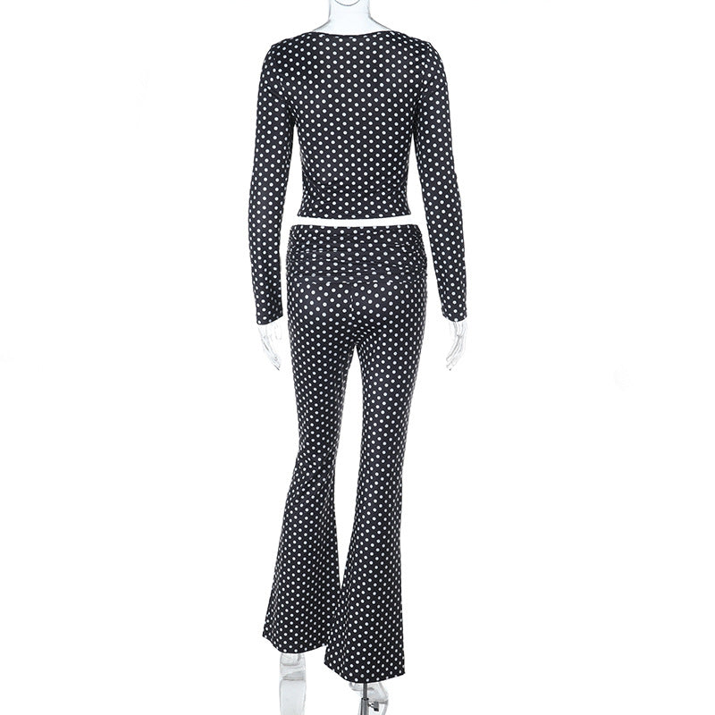 Damer figurnær jumpsuit med lange ermer og prikkete mønster Skjora