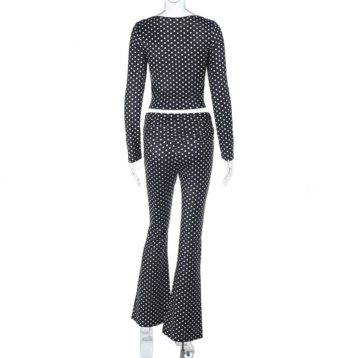 Damer figurnær jumpsuit med lange ermer og prikkete mønster Skjora