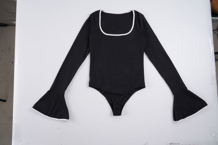 Dame Body med lange ermer og elegant rysjekant Skjora