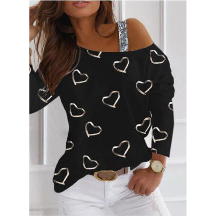 Kvinnelig motesweater med hjerteformet design og glitrende aksenter Skjora