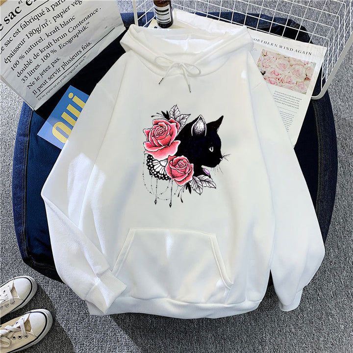 Dame hettegenser med blomstermotiv av katt Skjora