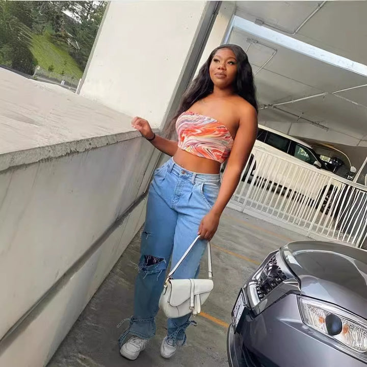 Uformelle kvinne mom jeans med trendy ødelagt utseende Skjora