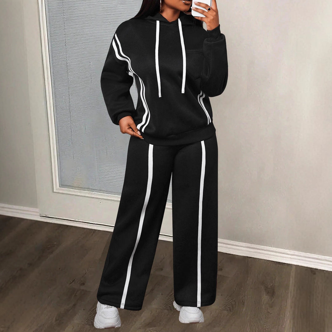 Dame sporty loungewear-set med oppbrettede ermer og sidestreker Skjora