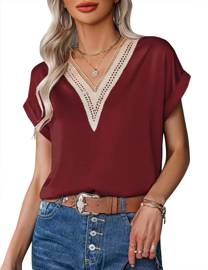 Damebluse med elegant spisskantdetalj Skjora