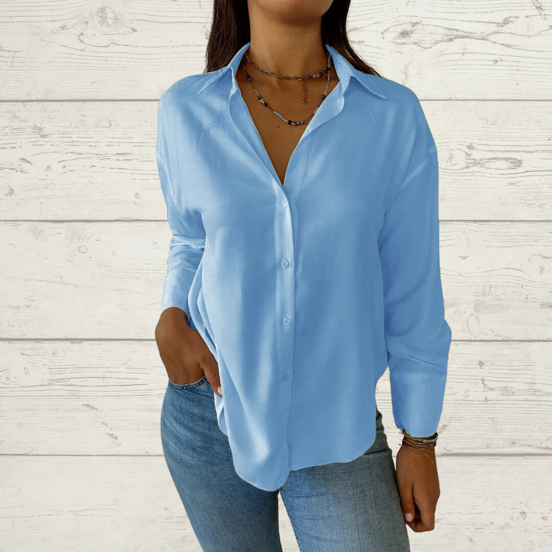 Dame elegant langermet bluse med fint stoff og feminine detaljer Skjora
