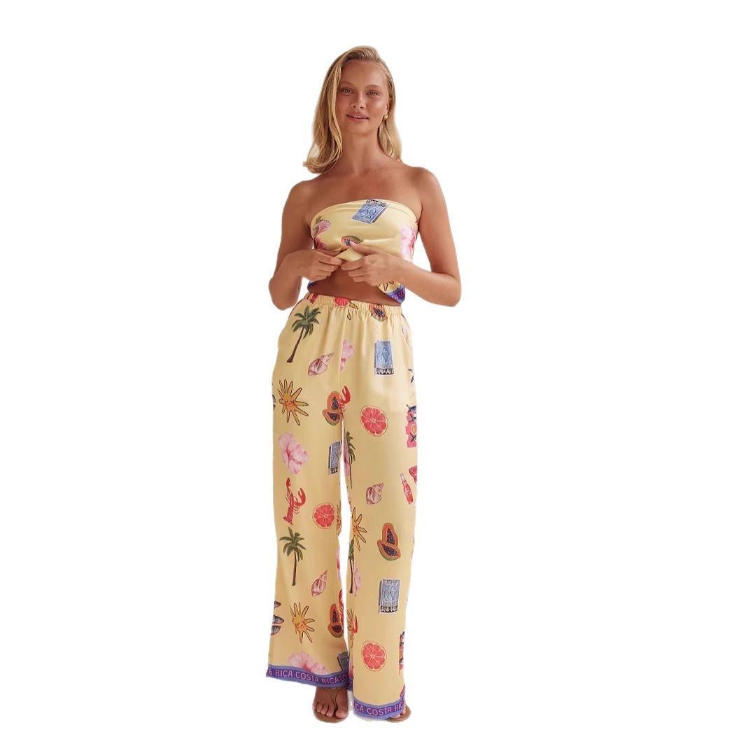 Kvinnens jumpsuit med lekne tropiske mønstre og elastisk topp Skjora