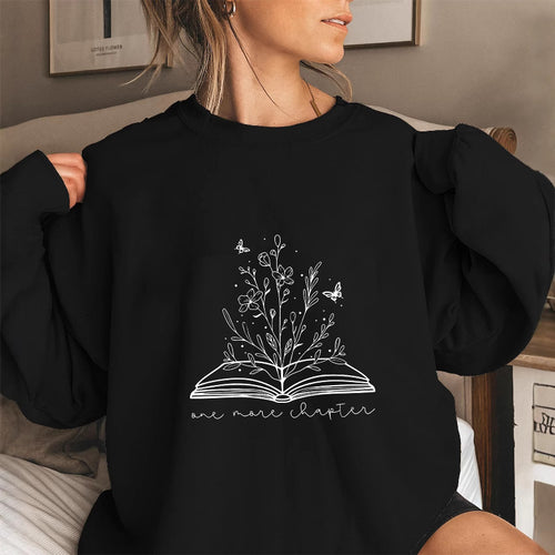 Kvinne genser med elegant blomst design og inspirerende trykk Skjora