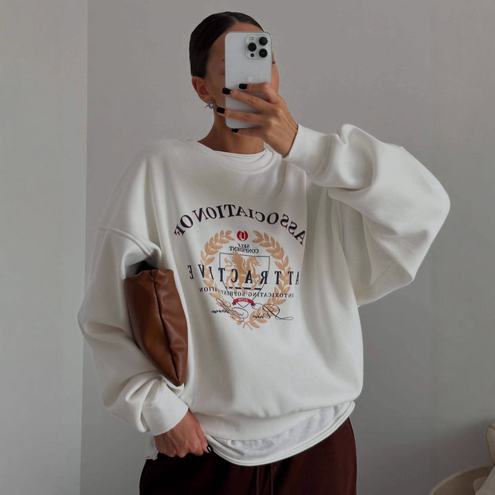 Kvinnehettegenser med kreativt trykk og oversized passform Skjora